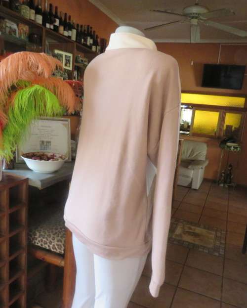 Cosy, warm cream/tan/white colour block long sleeve brushed polyester top.Size 38/14.Dolman sleeves.