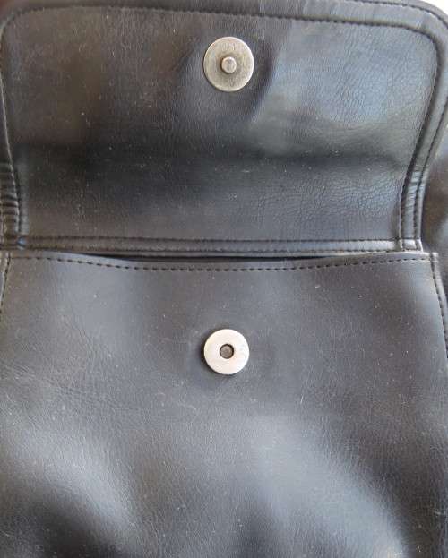 Fabulous soft black faux leather shoulder bag.3 divisions.Zip-ups + press button.26cm x 32cm.As new