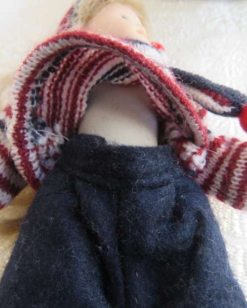 Antique doll 16cm tall with clothing. See scans. Very good condition