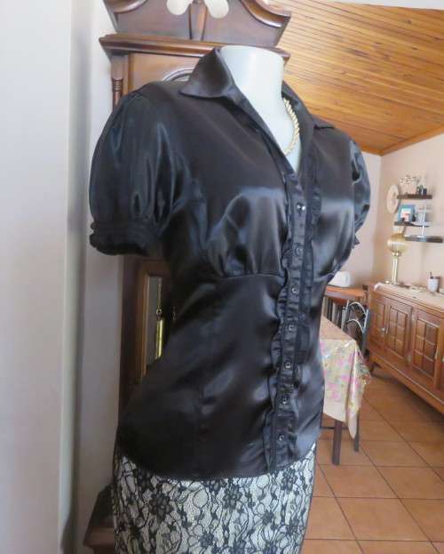 As new black shiny/stretch satin/polyester button down top.V and collar.Empire front.OASIS 34