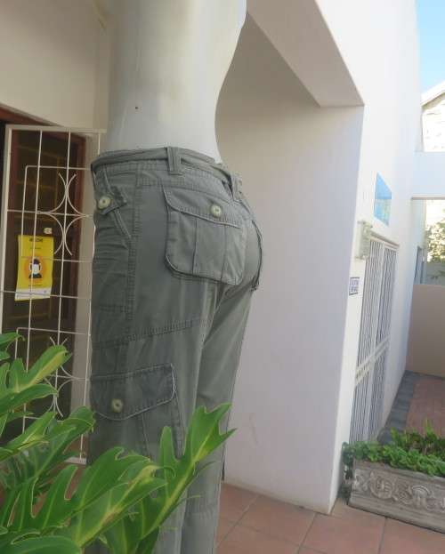 Vintage authentic 100% cotton. Wash out distressed look.Sage green.Pockets and stitching galore. 34.