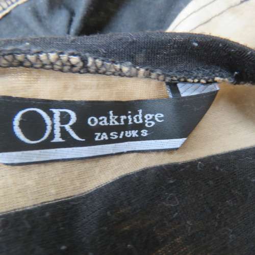 Real beaut! Black/rich cream horizontal stripes. Sheer black sleeve edging and back inlay.Size 38.