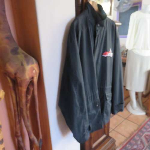 Black parka jacket in heavy cotton fully lined by CARTER HARRIS. Size XXL.Large pockets.Zipped front