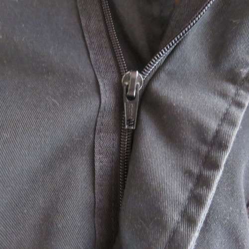 Black parka jacket in heavy cotton fully lined by CARTER HARRIS. Size XXL.Large pockets.Zipped front