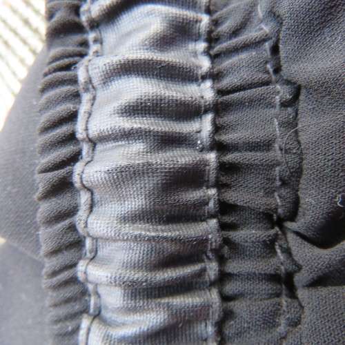 Unique soft polyester pants with elasticated waist/leg cuffs and drawstring. Side pockets.Size 40