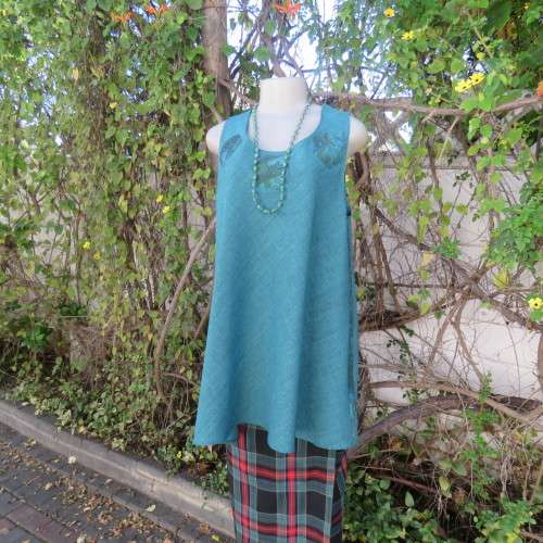 Boutique made mottled jade wide cut sleeveless top size 42. Floral inlays and decorations.