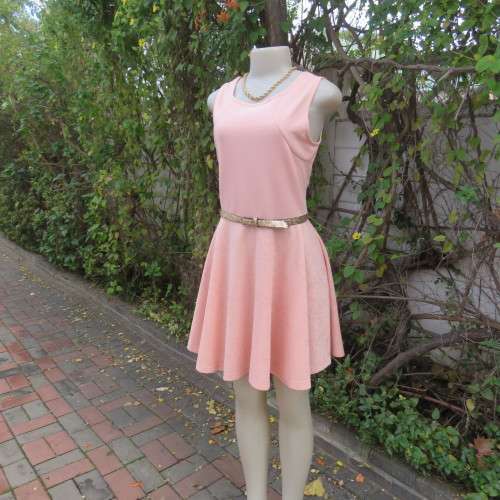 Sweet light peach stretch polyester skater style sleeveless dress by RT in size 36/12. Low back.