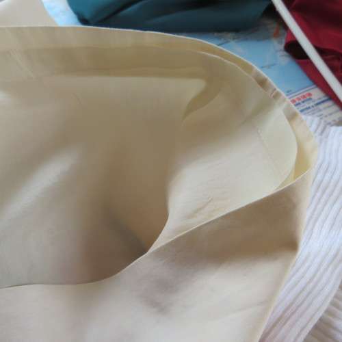 Grab this skirt! By designer VIVIENNE TAM in size 32/8. Rich cream/lined with embroidery at side.