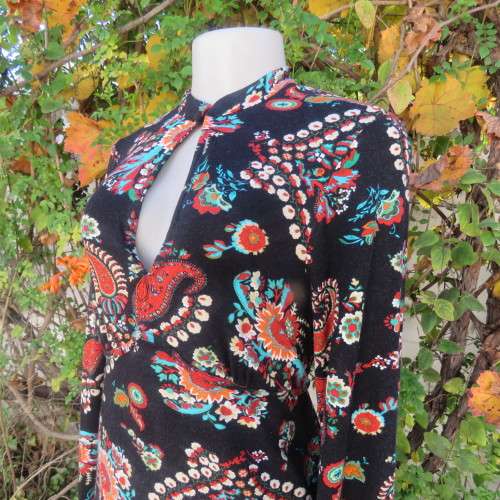 Soft black viscose stretch with paisley and floral pattern in brick/jade/cream.Size 36 by WOOLWORTHS