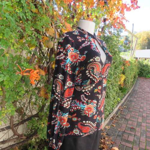Soft black viscose stretch with paisley and floral pattern in brick/jade/cream.Size 36 by WOOLWORTHS