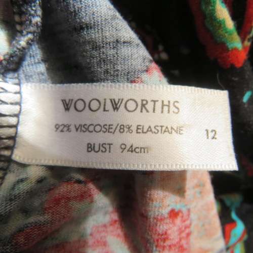 Soft black viscose stretch with paisley and floral pattern in brick/jade/cream.Size 36 by WOOLWORTHS