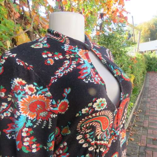 Soft black viscose stretch with paisley and floral pattern in brick/jade/cream.Size 36 by WOOLWORTHS