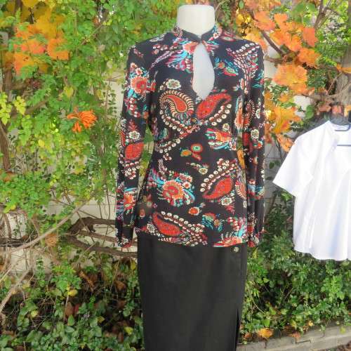 Soft black viscose stretch with paisley and floral pattern in brick/jade/cream.Size 36 by WOOLWORTHS