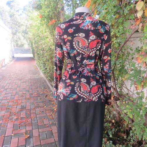 Soft black viscose stretch with paisley and floral pattern in brick/jade/cream.Size 36 by WOOLWORTHS