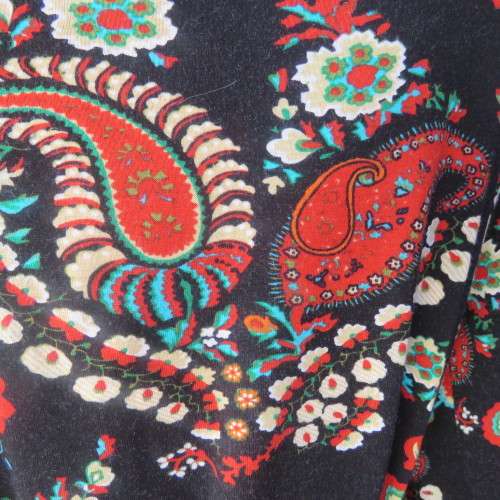 Soft black viscose stretch with paisley and floral pattern in brick/jade/cream.Size 36 by WOOLWORTHS