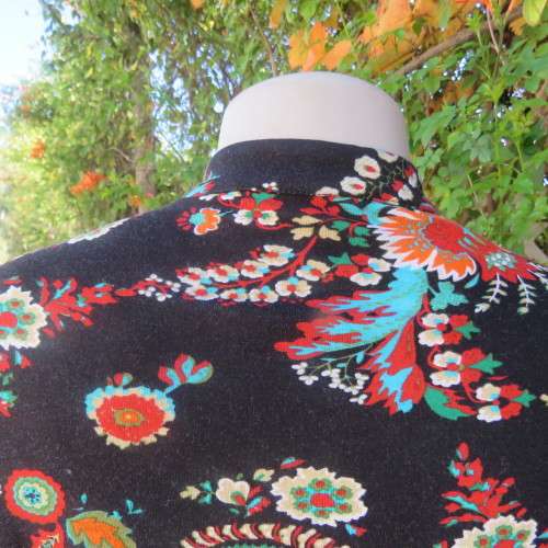 Soft black viscose stretch with paisley and floral pattern in brick/jade/cream.Size 36 by WOOLWORTHS