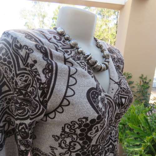 Beautiful grey/black baroque patterned fold over long sleeve dress. Stretch jersey fabric.Size 36/12