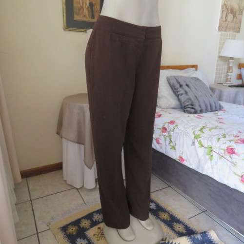 Choc brown dress pants by TOPICS in perfect fit 36/12. Straight legs. Very tiny front dummies.As new