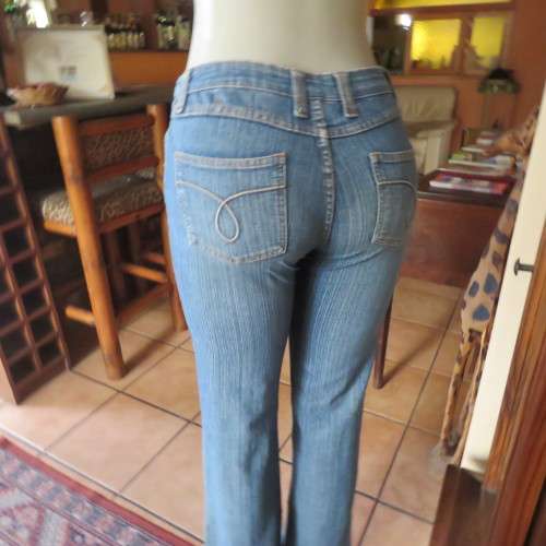 Straight legged blue ankle length jeans by WWW size 34/10. Very little stretch. Pockets back/front..