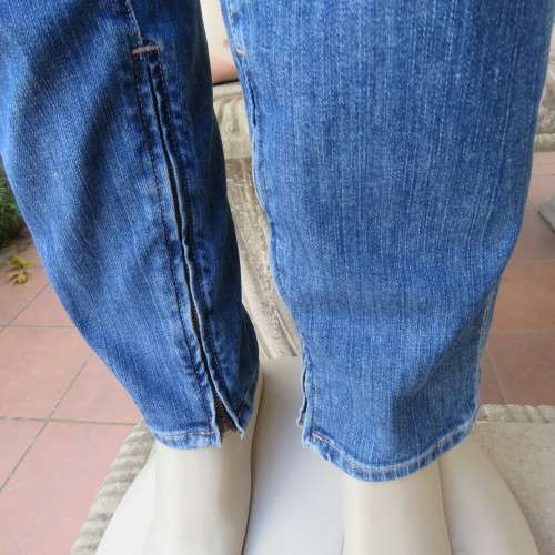 Top of the line skinny jeans by LUCKY BRAND size 38/14. Zips at leg bottoms. Polycotton stretch