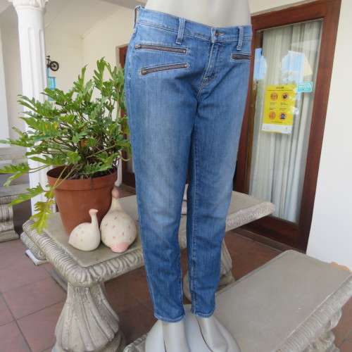 Top of the line skinny jeans by LUCKY BRAND size 38/14. Zips at leg bottoms. Polycotton stretch