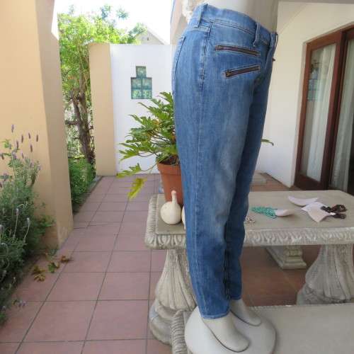 Top of the line skinny jeans by LUCKY BRAND size 38/14. Zips at leg bottoms. Polycotton stretch