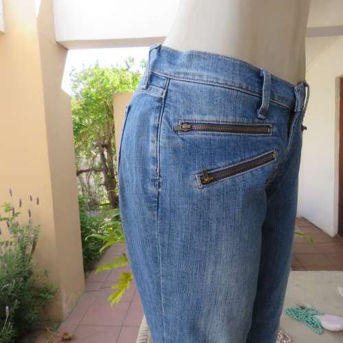Top of the line skinny jeans by LUCKY BRAND size 38/14. Zips at leg bottoms. Polycotton stretch