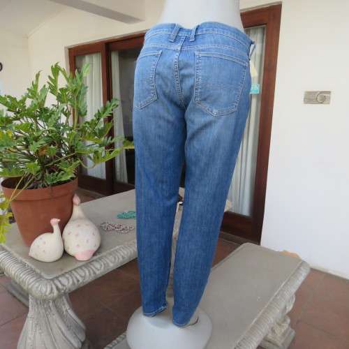 Top of the line skinny jeans by LUCKY BRAND size 38/14. Zips at leg bottoms. Polycotton stretch