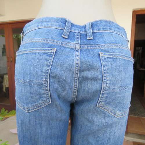 Top of the line skinny jeans by LUCKY BRAND size 38/14. Zips at leg bottoms. Polycotton stretch