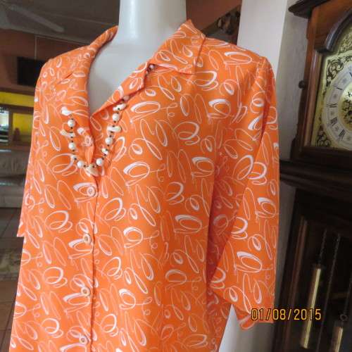 Get into summer! Crimson with white curls polyester button down boutique made top. Size 42. New cond