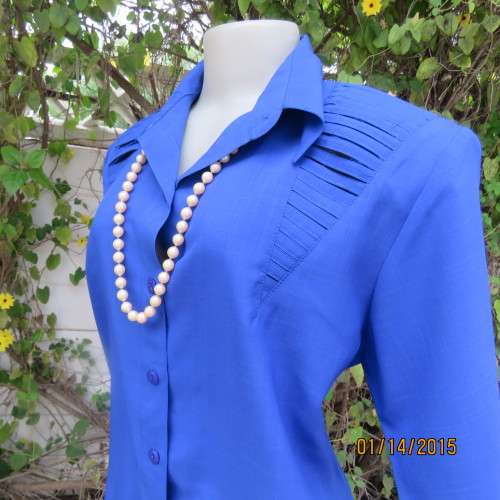 Make a statement with this royal blue uniquely styled polycotton top by B.S.TRADE size 42/18. As new