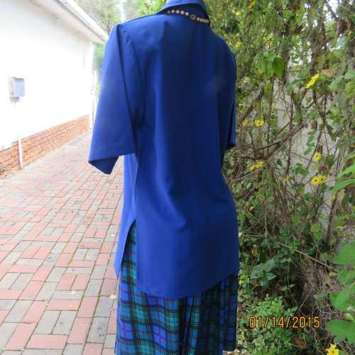 Make a statement with this royal blue uniquely styled polycotton top by B.S.TRADE size 42/18. As new