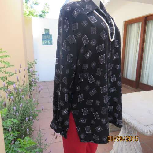 Very black long cuffed sleeve top with white square/round designs. By REFLEX size 42/18. As new.