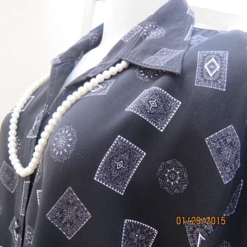 Very black long cuffed sleeve top with white square/round designs. By REFLEX size 42/18. As new.
