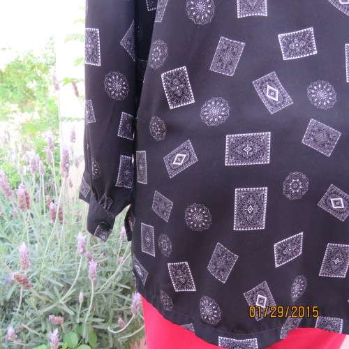 Very black long cuffed sleeve top with white square/round designs. By REFLEX size 42/18. As new.