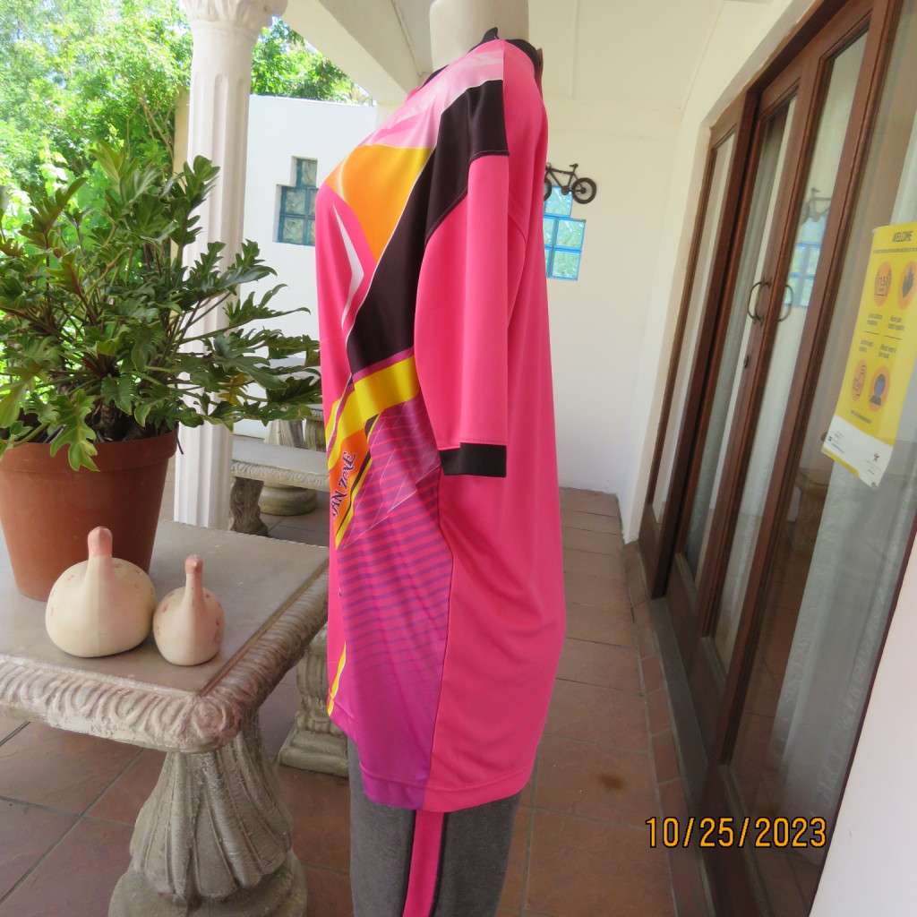 New TITAN ZONE sports slip over top in stretch polyester. Pink/yellow/black. Size 42/18. V neck.