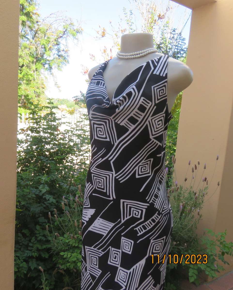 Sleek monochrome ankle length polyester dress in geometric print.Cowl neckline.Size 36/12  MILADY`S