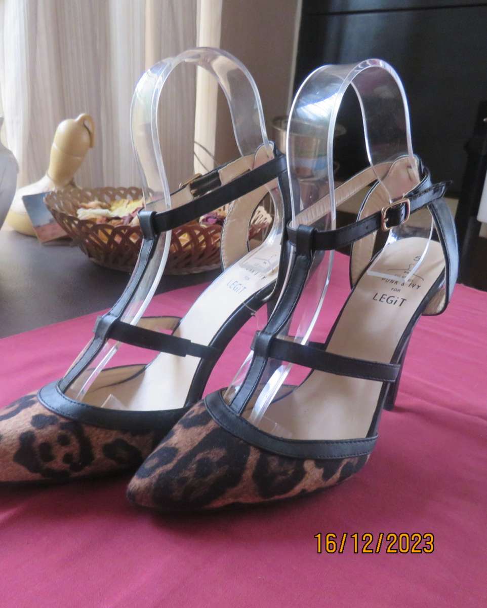 Pair of PUNK & IVY black and animal print high heel shoes. T strap. Size 5. Ankle strap.As new