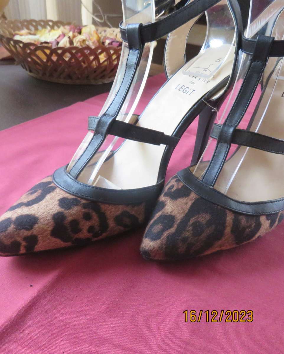 Pair of PUNK & IVY black and animal print high heel shoes. T strap. Size 5. Ankle strap.As new
