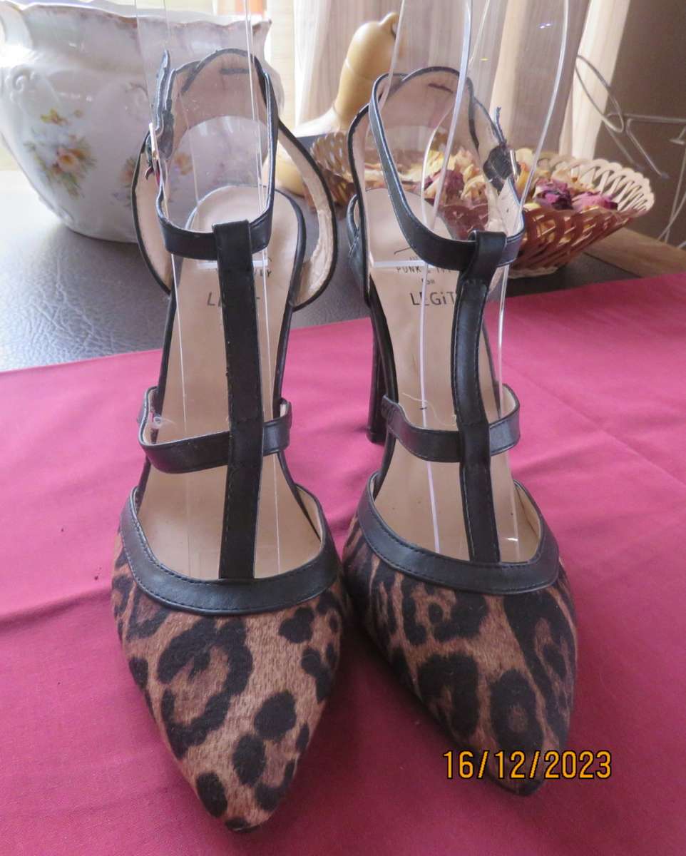 Pair of PUNK & IVY black and animal print high heel shoes. T strap. Size 5. Ankle strap.As new