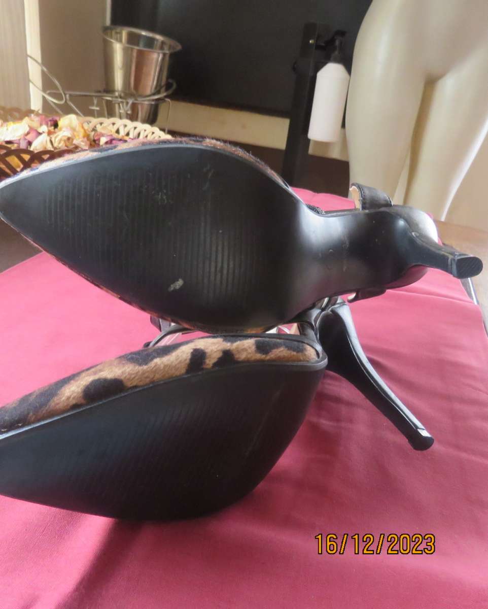 Pair of PUNK & IVY black and animal print high heel shoes. T strap. Size 5. Ankle strap.As new