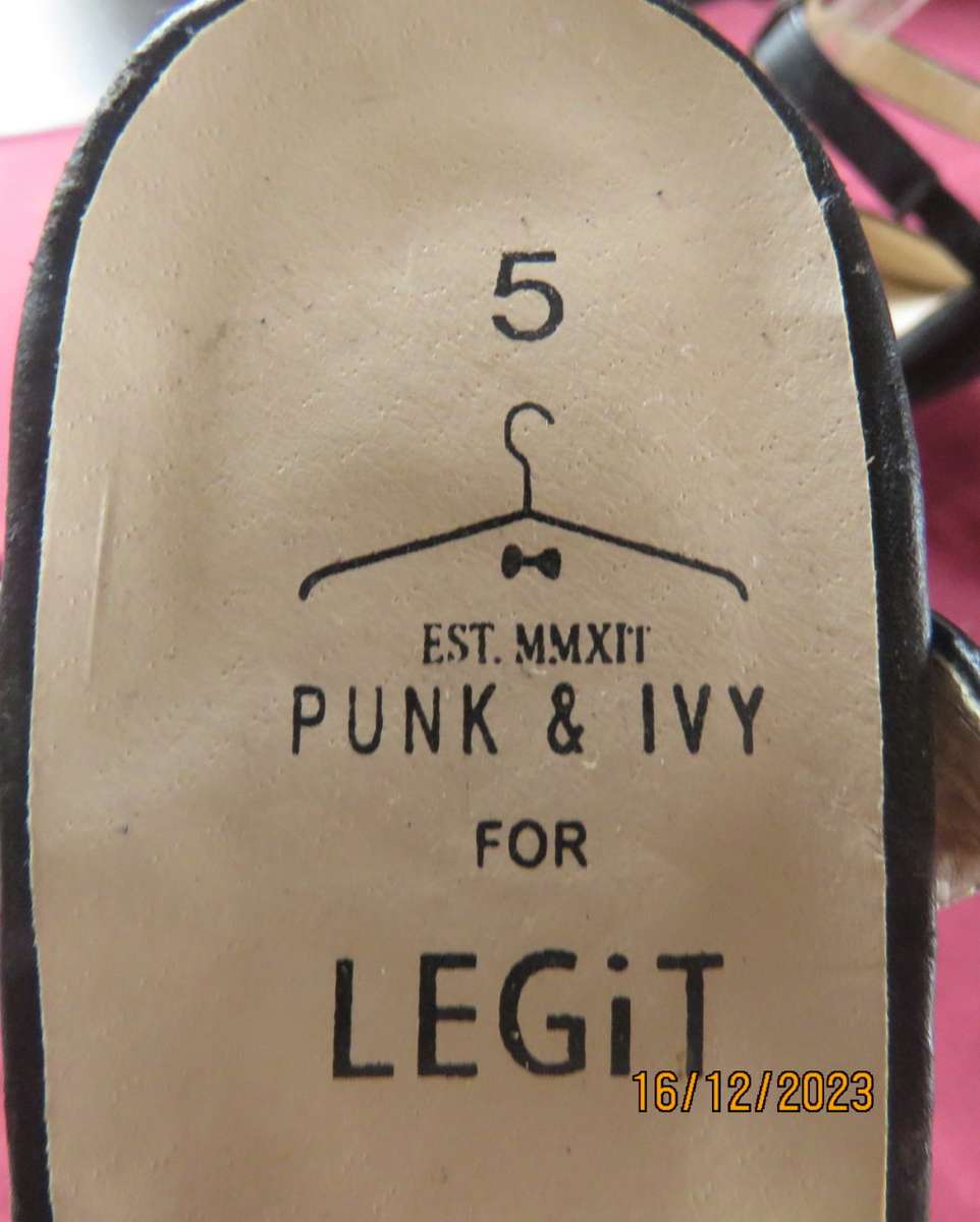 Pair of PUNK & IVY black and animal print high heel shoes. T strap. Size 5. Ankle strap.As new