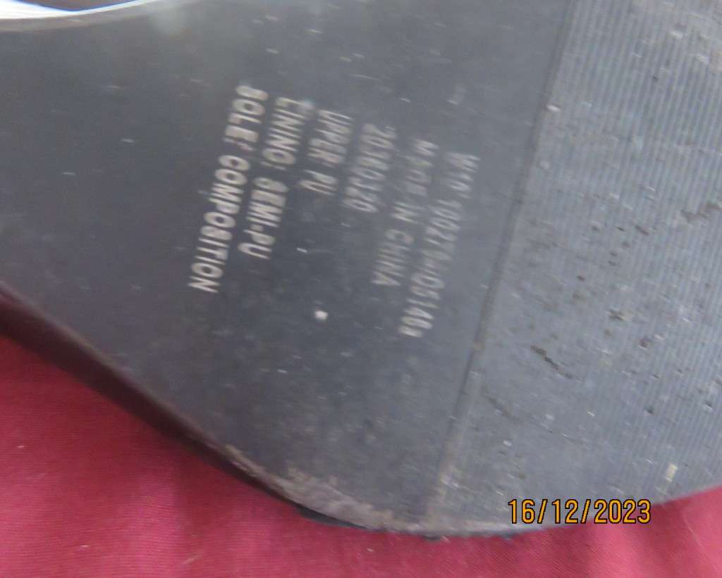 Pair of black shiny patent leather wedge heel shoes by QUEENSPARK size 5. Velvet crossovers.As new