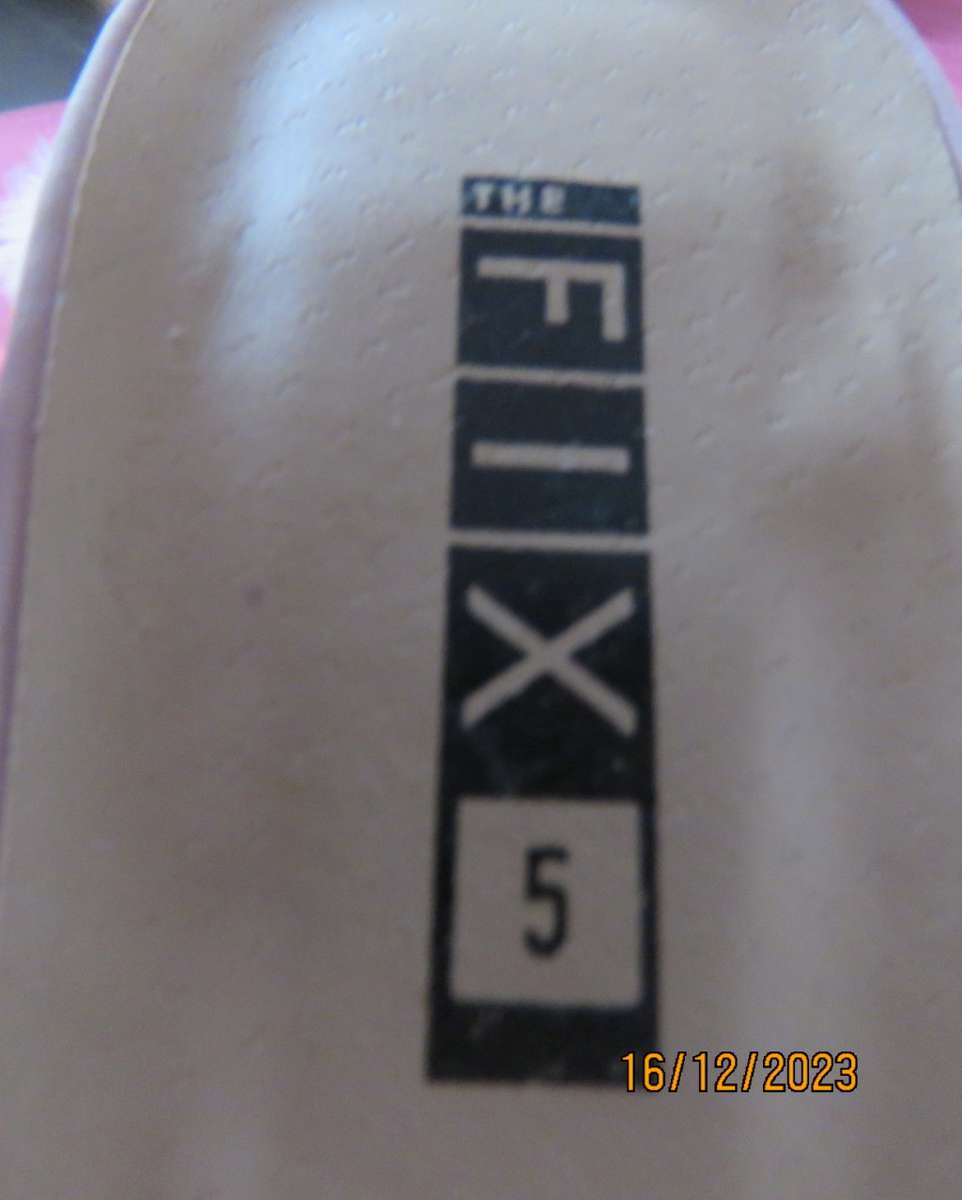 Pair of pale pink block heel sandals with ankle straps. Band over foot with faux fur.Size 5 by FIX.