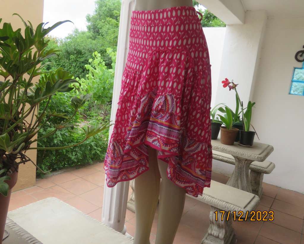 Sweet cheerful Magenta pink/white tiered skirt pulled up om left front. Size 40. By JUDY`S PRIDE.