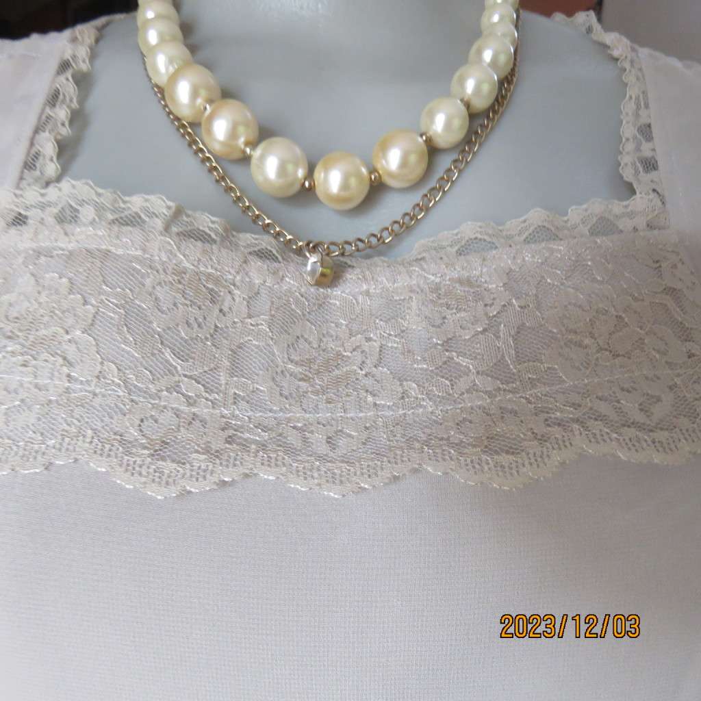 Smart ecru colour dropped waist dress with tiered bottom. Size 36. Square neckline. Fully lined.