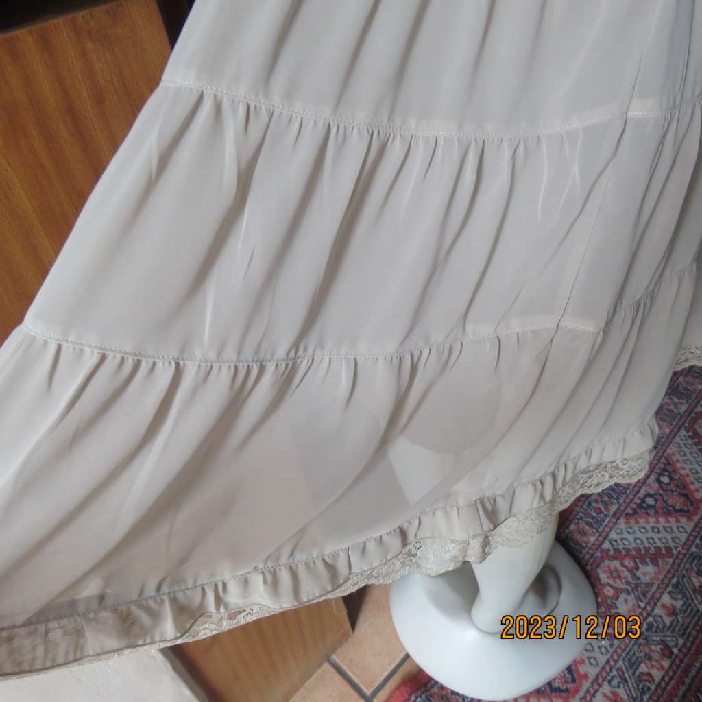 Smart ecru colour dropped waist dress with tiered bottom. Size 36. Square neckline. Fully lined.