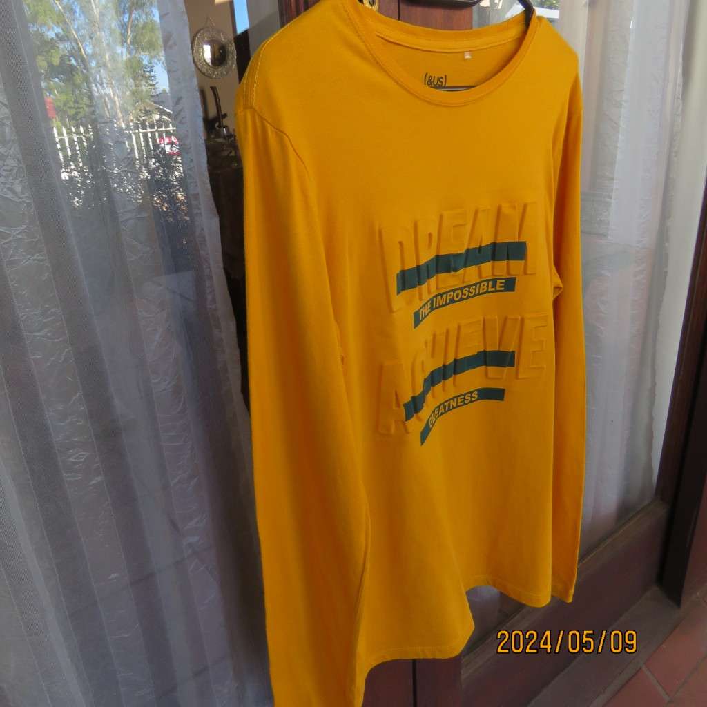 Unique mustard long sleeve 100% cotton top by (&US) size 15 to 16yr old boy. Stand out logo. New con