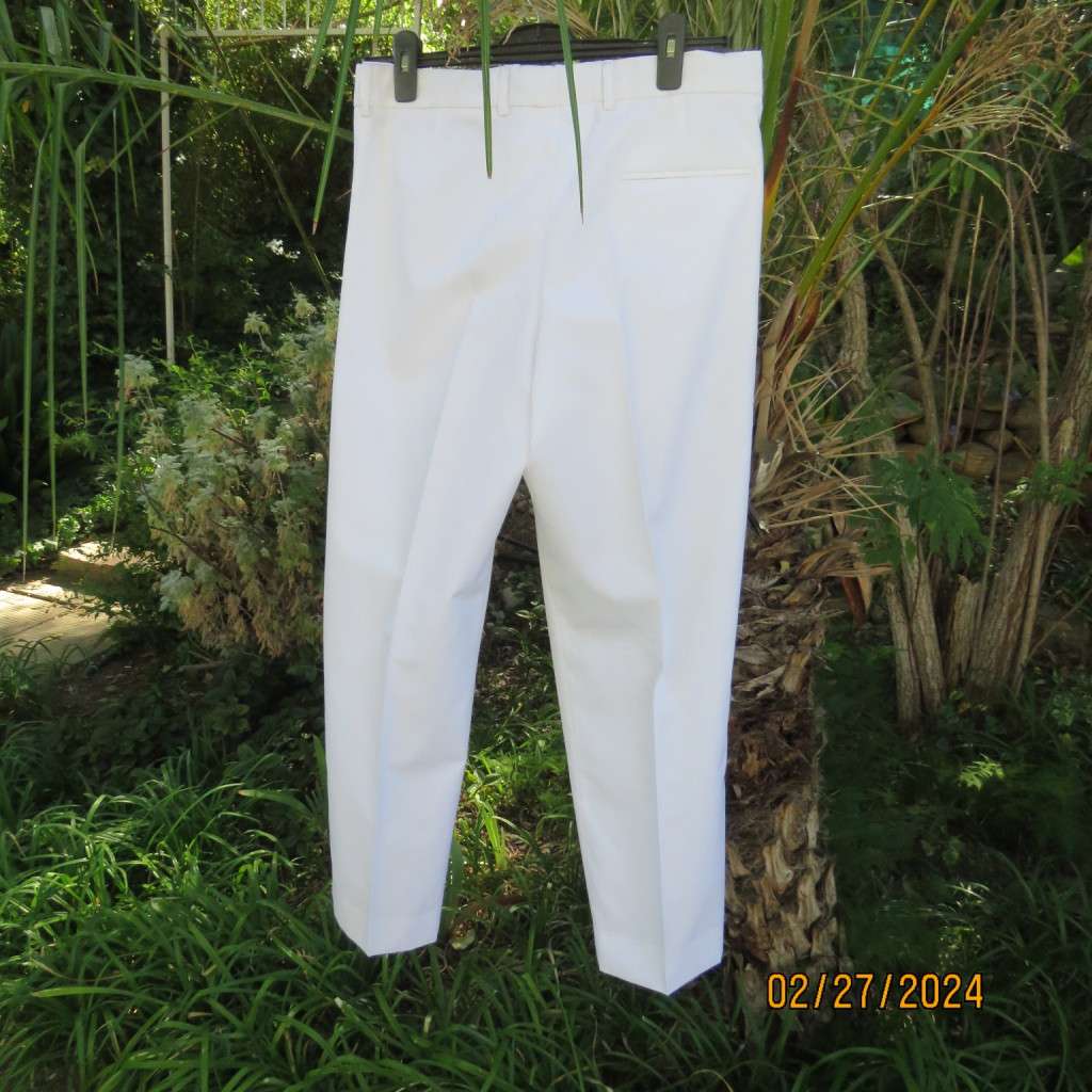New white poly/viscose pants by FG Uniforms 2008. Size 34... 87cm/74RS. Pleats on front.Side pockets