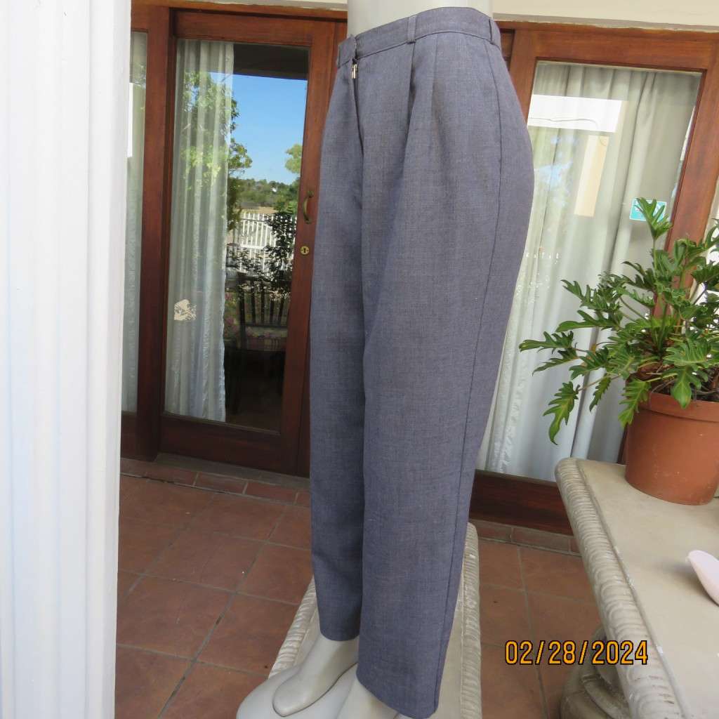 Classic pebble grey dress pants by PRINCESS from 80`s. Wool/polyester blend. Size 36/12.As new
